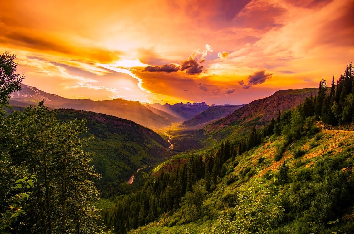 https://www.pexels.com/photo/green-mountain-near-river-under-cloudy-sky-during-daytime-247478/