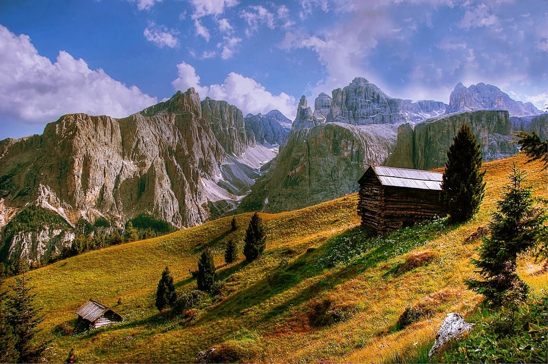 https://www.pexels.com/photo/cabin-clouds-countryside-grass-459057/