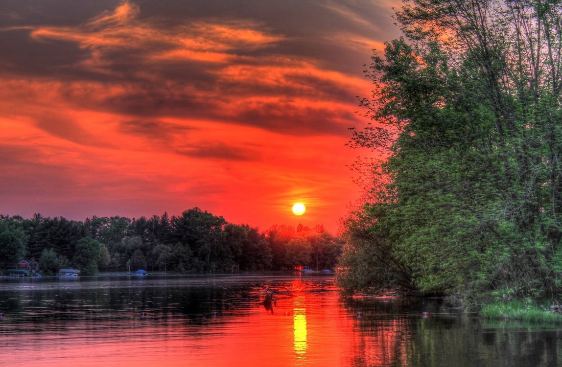 https://www.pexels.com/photo/scenic-view-of-lake-during-sunset-248800/