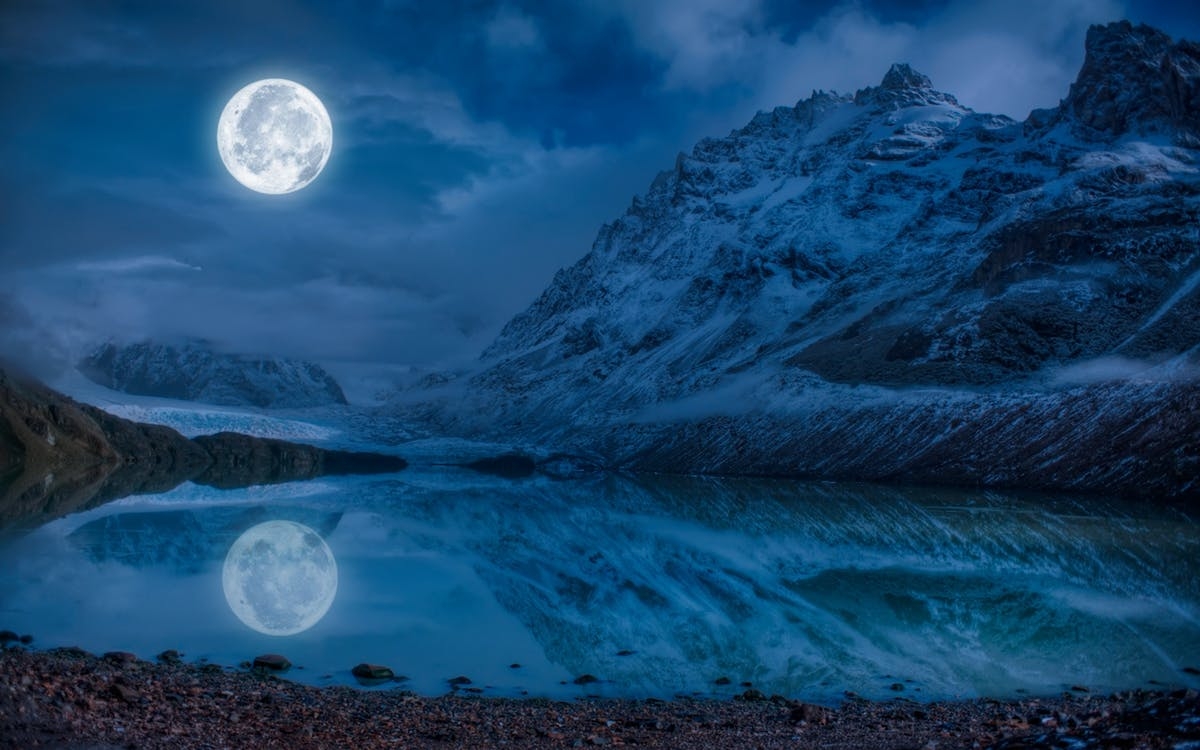 https://www.pexels.com/photo/full-moon-near-snowcap-mountain-158056/