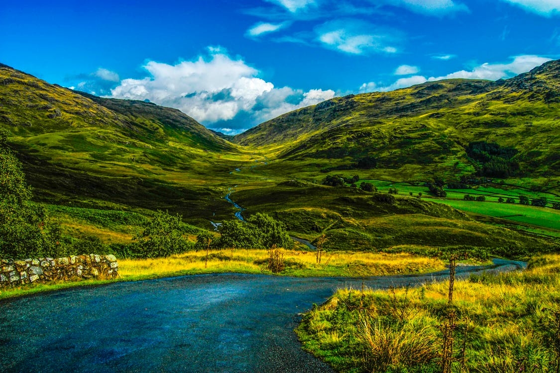 https://www.pexels.com/photo/clouds-countryside-daylight-grass-406142/