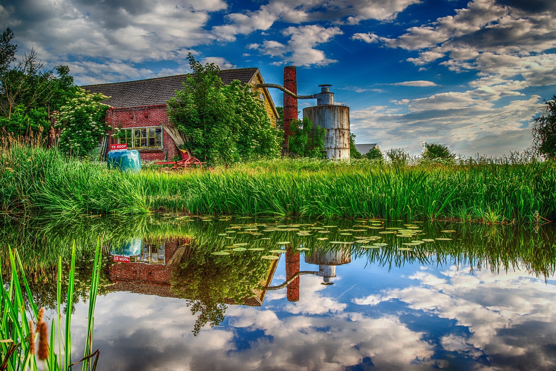 https://pixabay.com/en/countryside-water-reflection-nature-2474639/